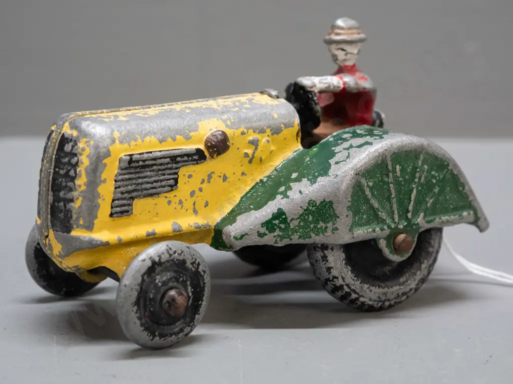 vintage Fun Ho cast alloy tractor with hollow metal wheels, marked Oliver on mudguards, faint Fun Ho mark and number Image 1++
