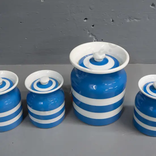 4 pieces T&G Green blue & white Cornish ware - one large lidded canister H-120 D-110 and 3 smaller