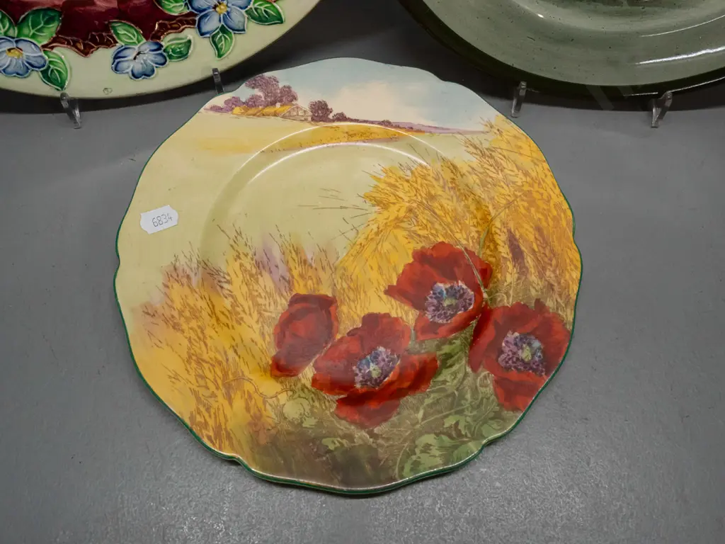 3 cabinet plates - Maling lustre thumbprint D-280 and 2 Doulton - Poppies and one other. All have some wear / scratching Image 1++
