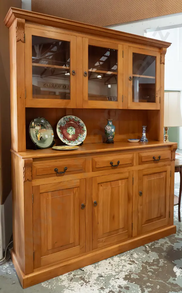 reproduction colonial-style rimu dresser with 3 glazed doors in top, one shelf, above panelled gallery, 3 drawers and 3 Image 1++