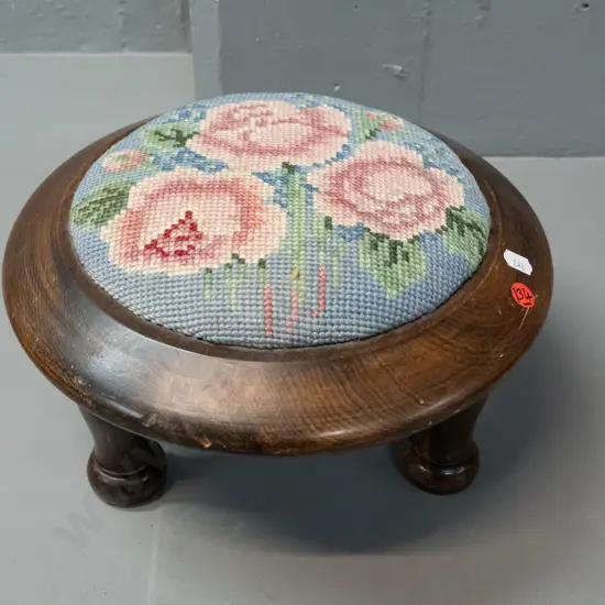 small dark stained rimu circular foot-stool with 3 turned legs, floral needlework top - some wear H-180 D-300