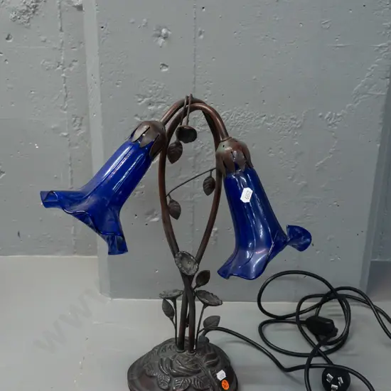 reproduction deco style lily motif table lamp with 2 lustre cobalt blue glass shades, cast metal bronze finish base -