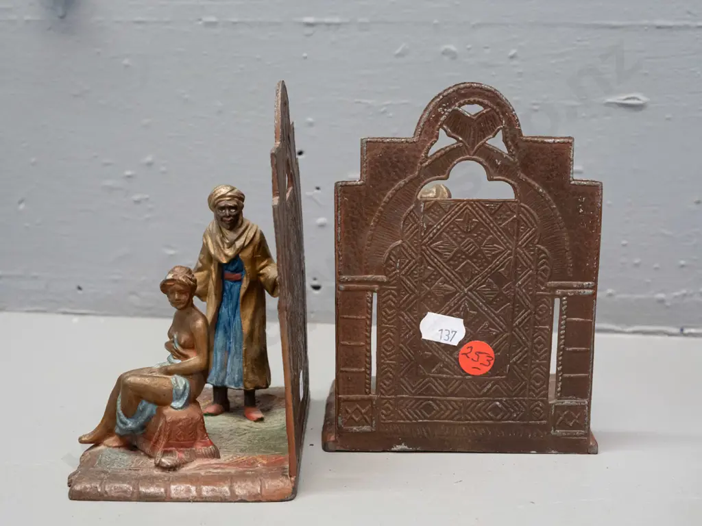 pair of Austrian cast metal book-ends with Arabian scenes and a Thai or Indonesian cast metal seated musician figure - Image 1++