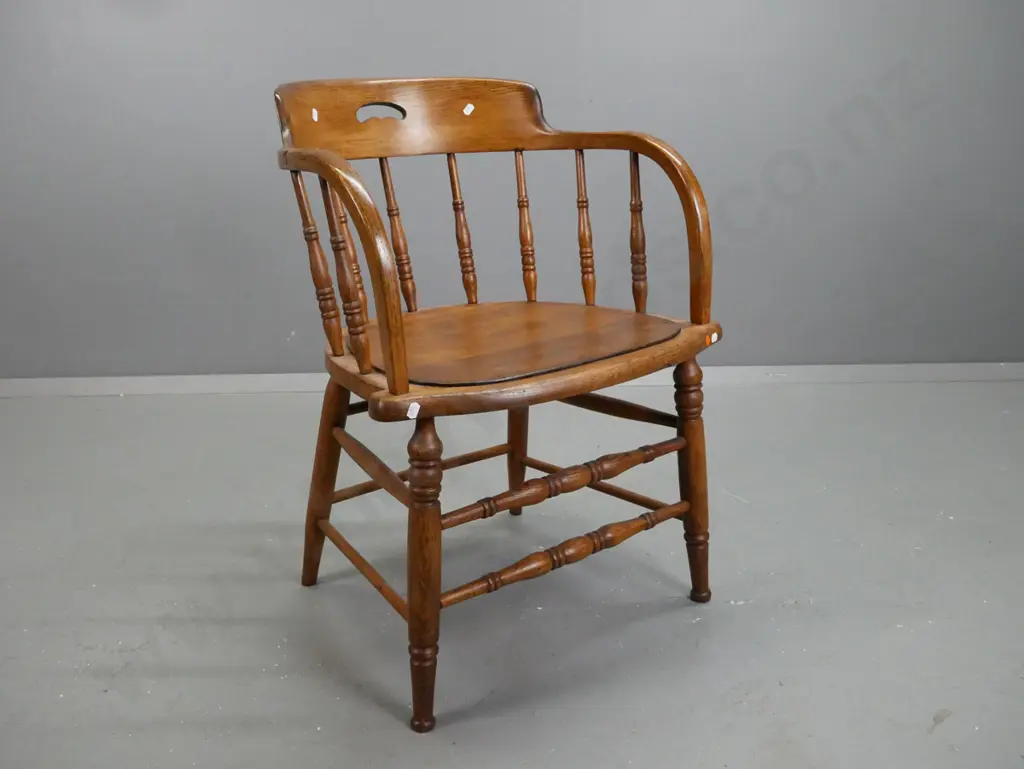 vintage oak Douglas chair with turned back spindles, double turned stretcher base. H750 W550 D470 Image 1++