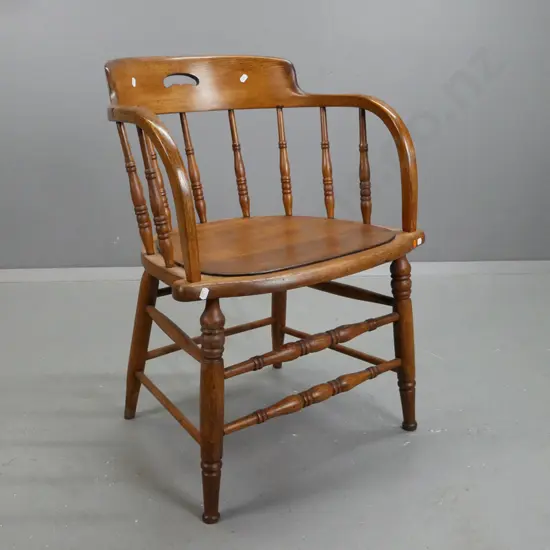 vintage oak Douglas chair with turned back spindles, double turned stretcher base. H750 W550 D470
