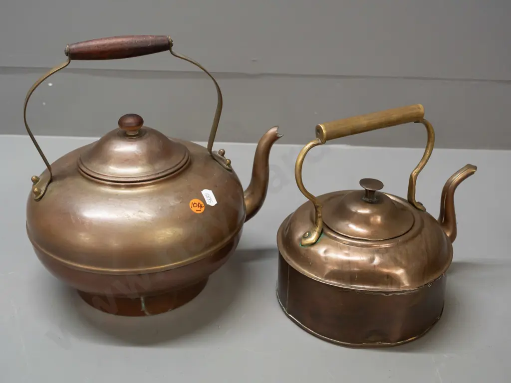 2 vintage copper plated kettles / teapots with brass handles - one with wooden handle and knob marked M.L.P. Chch Image 1++