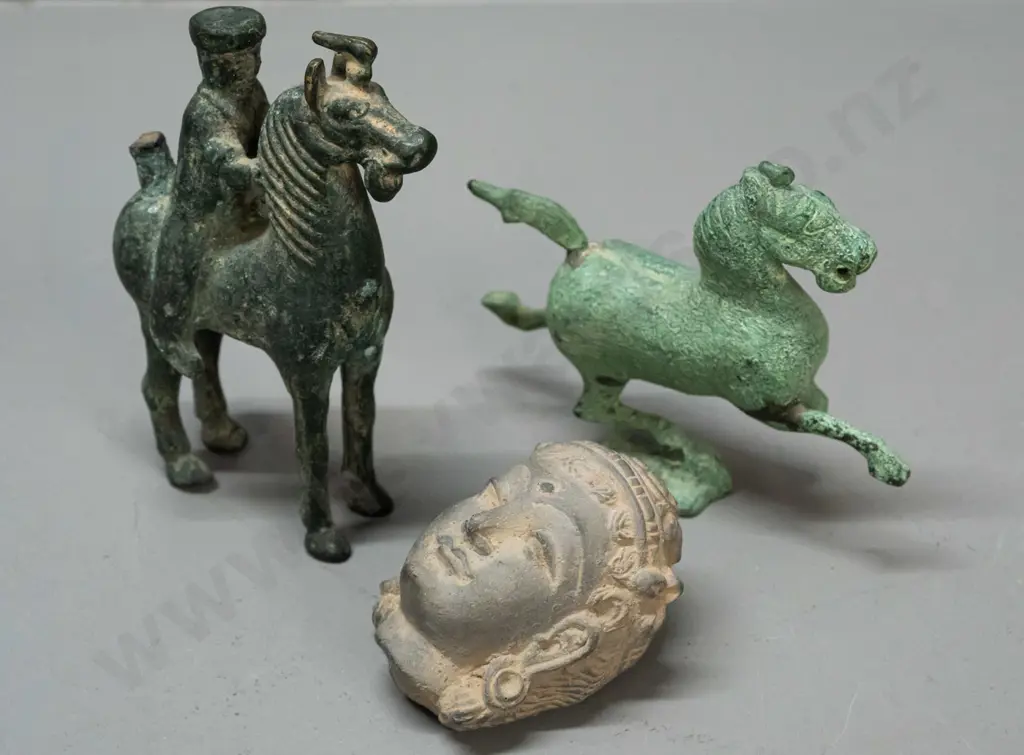 2 Asian cast metal (bronze?) horse figures and a cast clay head with a piece broken off the back - horse with rider is Image 1++