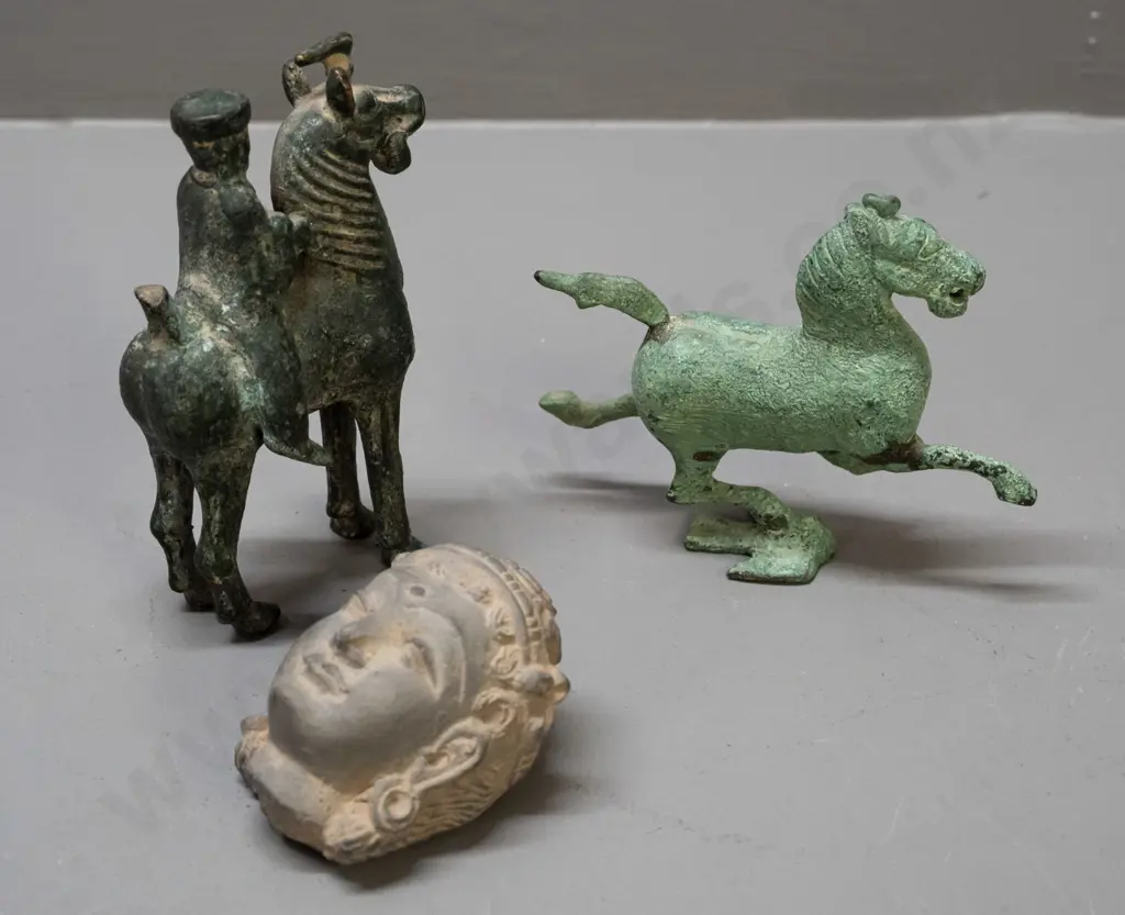 2 Asian cast metal (bronze?) horse figures and a cast clay head with a piece broken off the back - horse with rider is Image 1++