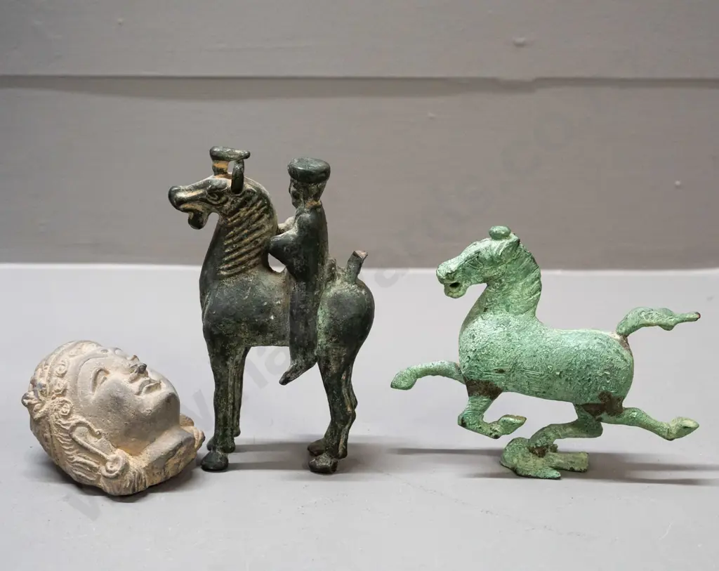 2 Asian cast metal (bronze?) horse figures and a cast clay head with a piece broken off the back - horse with rider is Image 1++