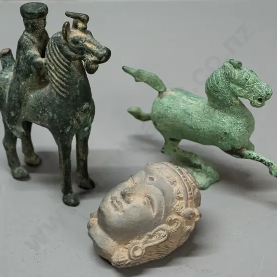 2 Asian cast metal (bronze?) horse figures and a cast clay head with a piece broken off the back - horse with rider is