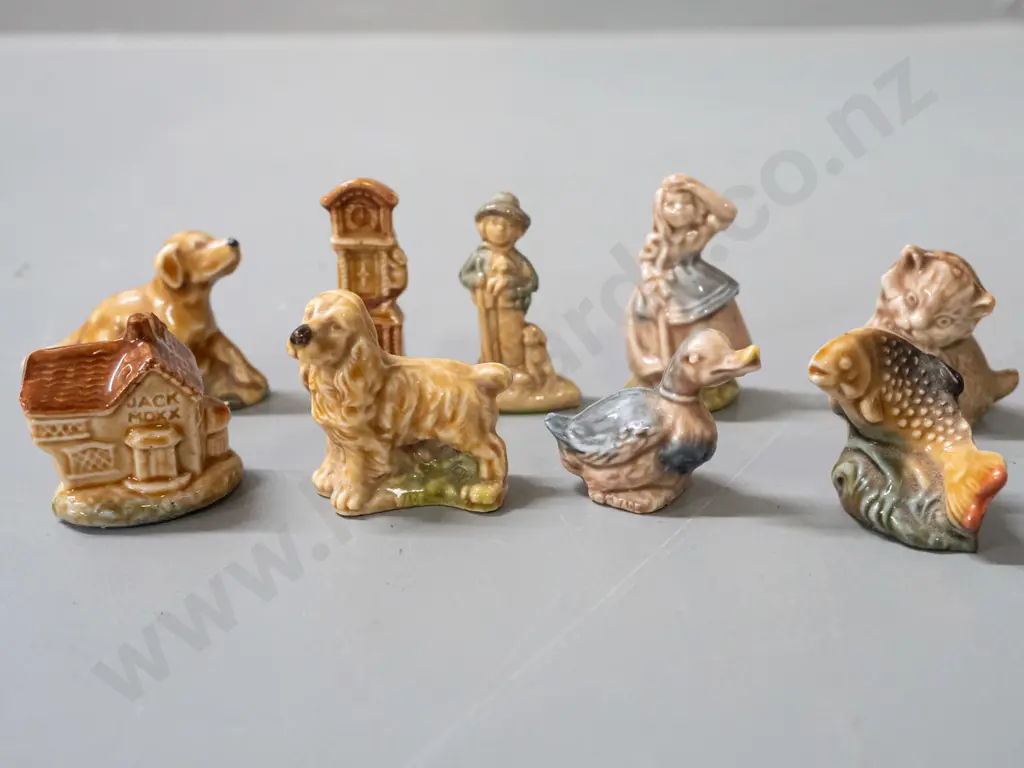 9 assorted Wade whimsies, some marked Wade - clock, dogs, duck, Jack Moxx cottage with small chip in base Image 1++