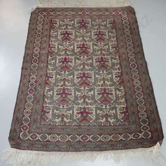 hand knotted Persian style floor rug. Reds, greys, greens, saffron colours, geometric pattern. Repairs