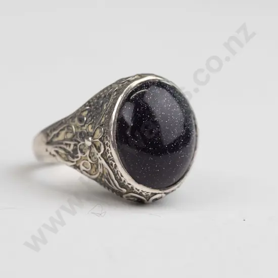 silver ring with dark speckle stone stamped stg size L