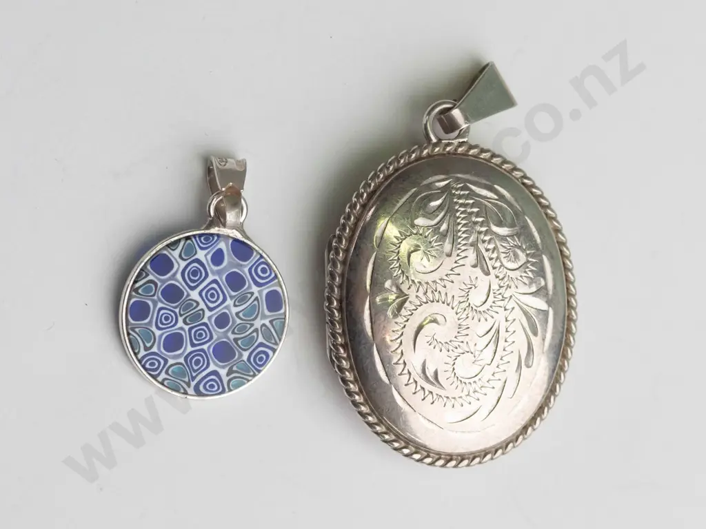 silver locket stamped stg sil & small blue pendant stamped 925  no chain for either Image 1++