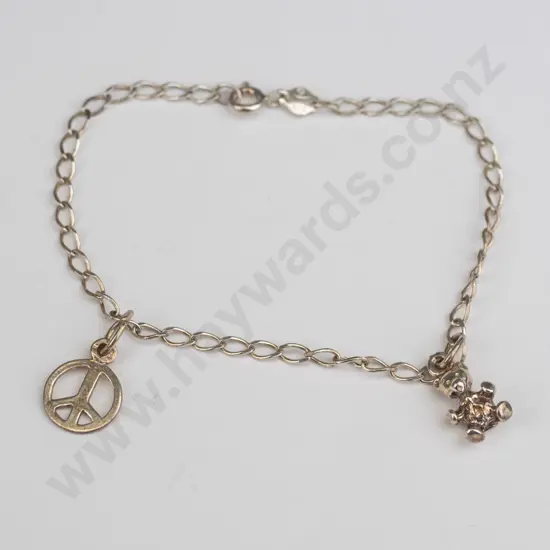 silver charm bracelet stamped 925 with teddy bear & peace sign charm