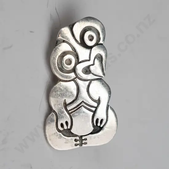 silver tiki brooch stamped sterling
