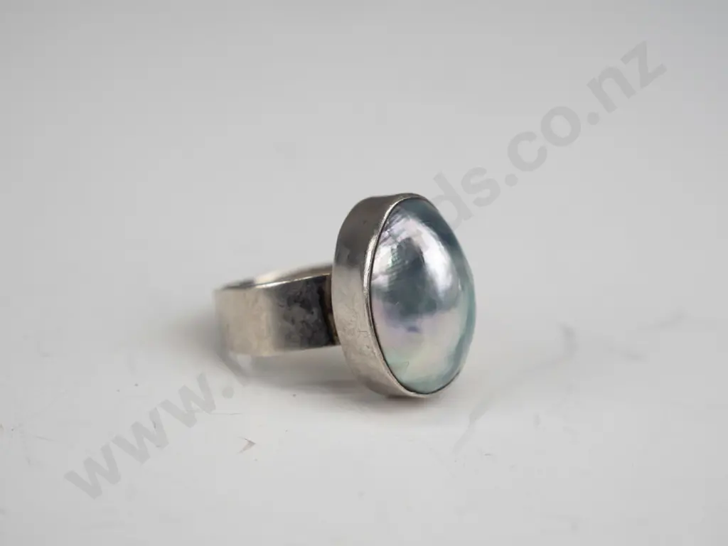 silver ring with milky stone stamped 925 size Q Image 1++