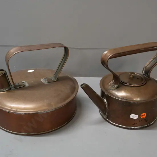 2 vintage rustically hand-made copper kettles - one with top mounted spout, other with hollow handle, both with some
