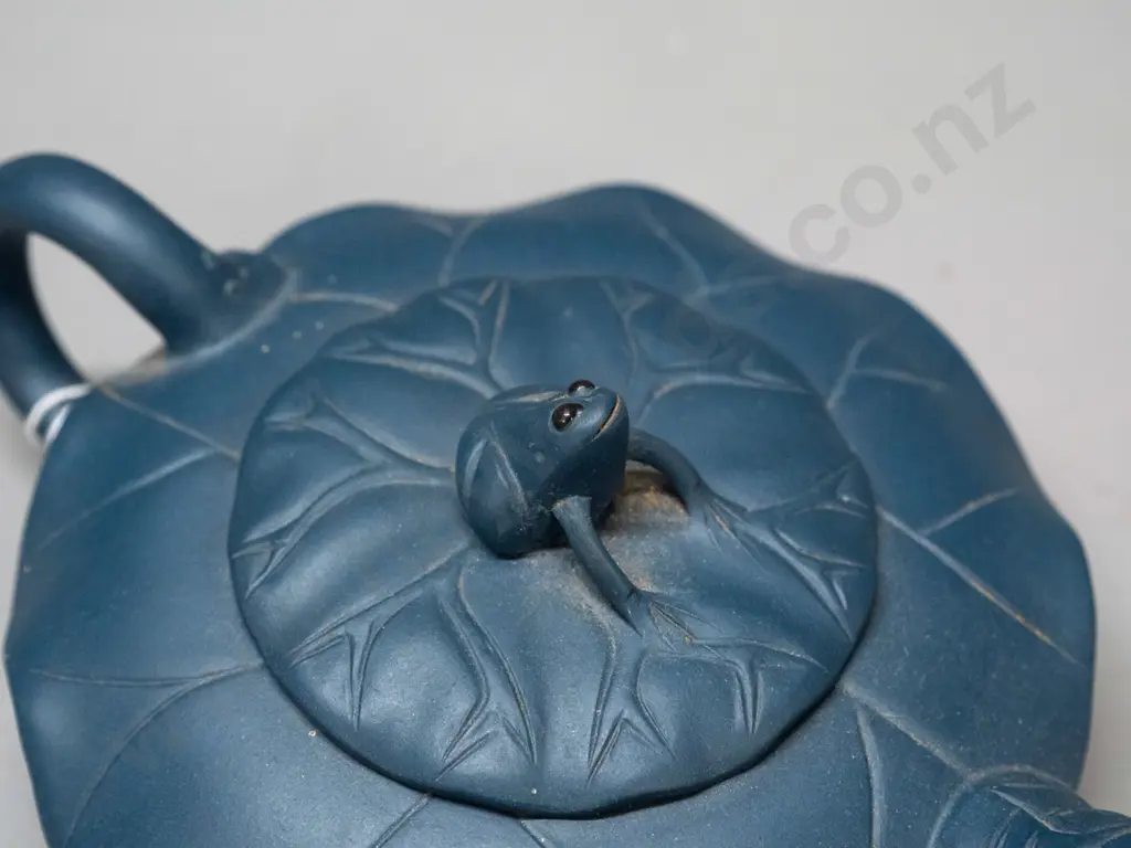 small Chinese clay teapot with lotus leaf shape and frog handle on lid, impressed character mark on bottom. H-50 L-160 Image 1++