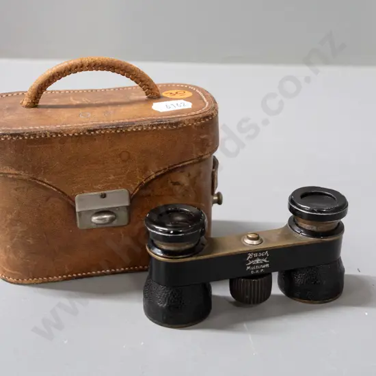 vintage Busch opera glasses with shagreen covering, brass body, marked Multinett DRP, focusing wheel marked Emil Busch