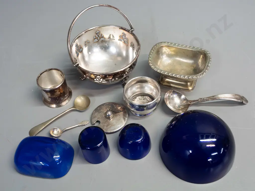 4 silver-plated salts & condiments with blue glass liners - and 3 spoons. Footed basket with handle H-110 L-100 marked Image 1++