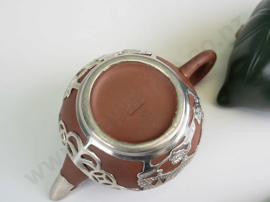 2 small Chinese clay teapots - green foliate with 2 silkworms and one with pierced plated dragon motif mounts, has had Image 1++