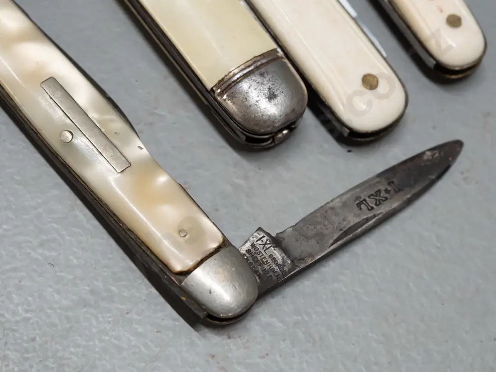 5 small vintage English pocket knives - 2 with mother of pearl handles, 3 faux bone/ivory, longest is L-90 Image 1++