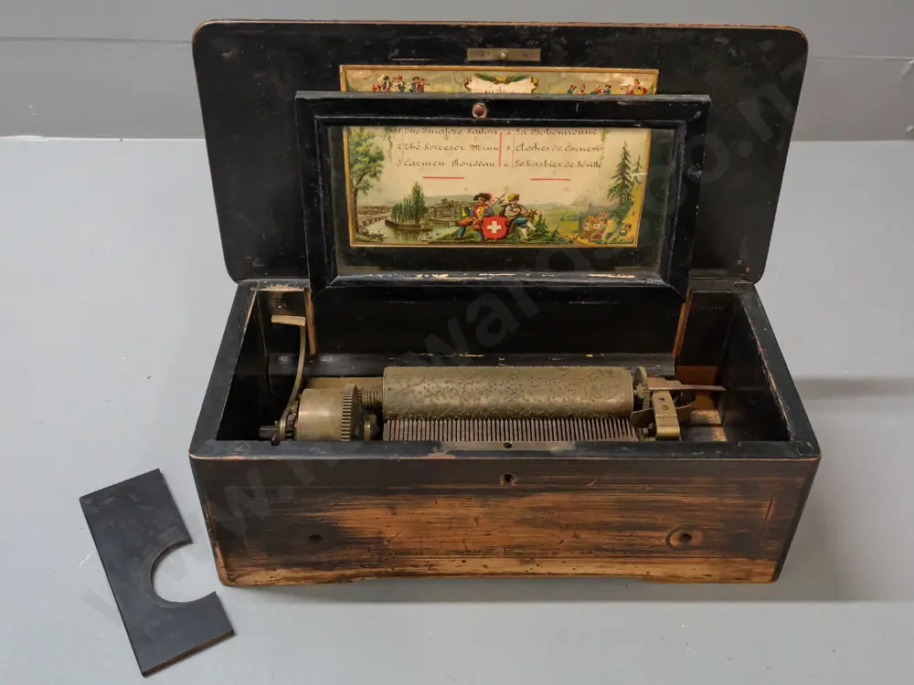 Victorian music box in restorer's condition - inlaid box with brass music mechanism, glazed panel, handwritten song list Image 1++