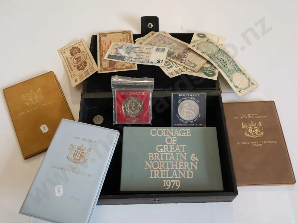 assorted coins and bank notes in leather case - uncirculated New Zealand sets 1985, 1987, 1988, 1979 Great Britain and Image 1++