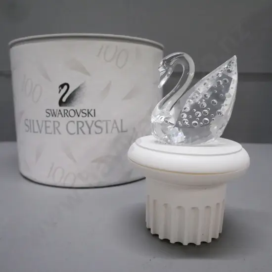Swarovski miniature swan figurine on plinth, w/ original packaging. Total H-110