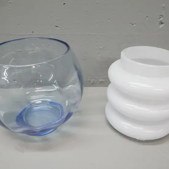2x vases: light blue bowl shaped vase with faceted sides & circular base; white over clear ribbed vase. Larger H-180