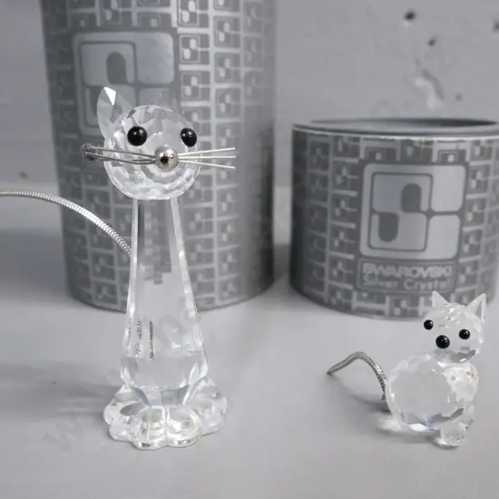 Swarovski 2x miniature cat figurines w/ original packaging. Larger H-80