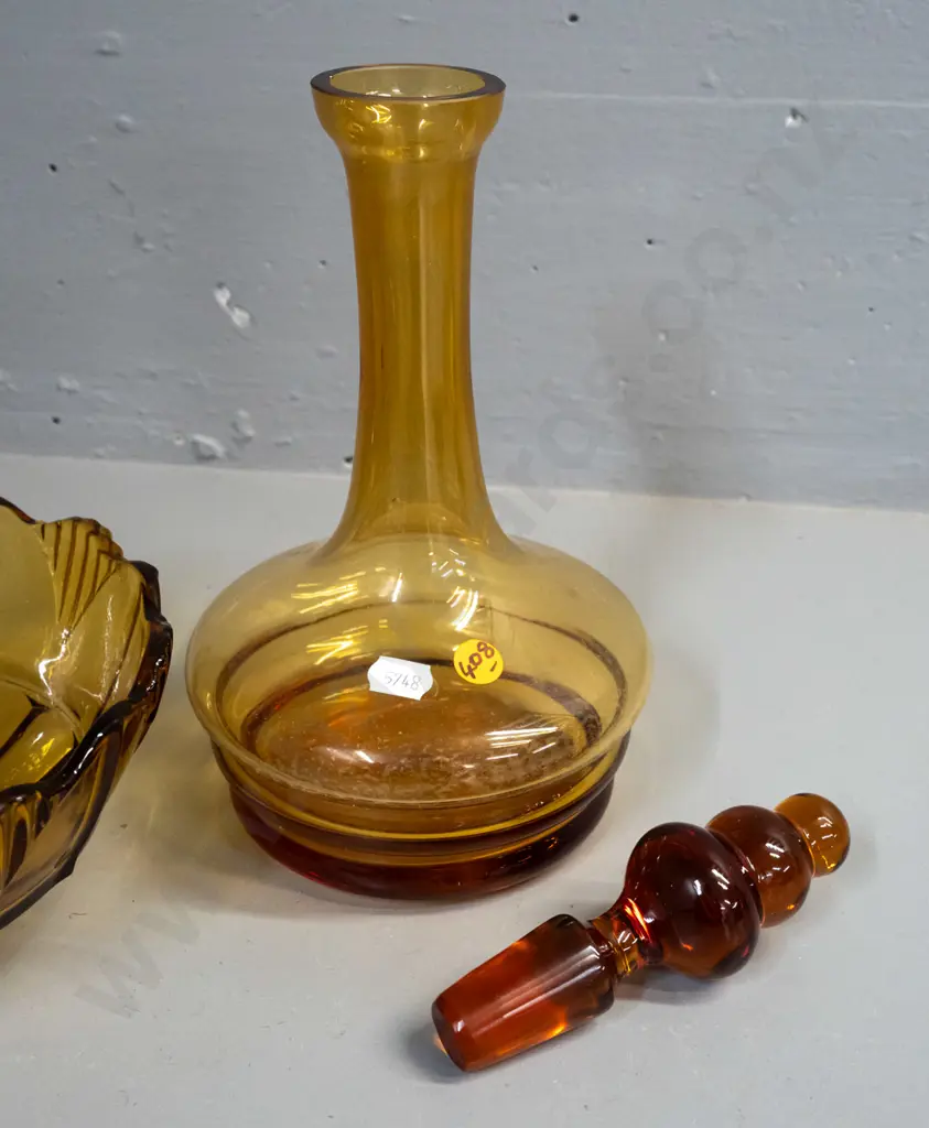 3 pieces of amber glass - stoppered decanter and 2 moulded salad bowls. Decanter has tiny nick in rim, some staining Image 1++