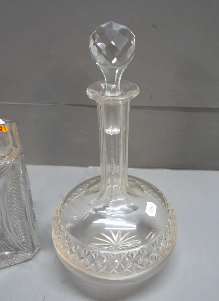2 stoppered crystal decanters - squat round H-265 and a heavy square design with etched diamond pattern corners H-250 Image 1++