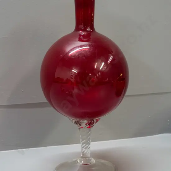 retro red glass globe-shaped bottle vase on clear twisted stem and circular base H-360 D-160