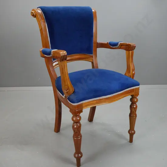 reproduction mahogany open armchair, upholstered seat and arm pads. Turned cabin cover front legs.