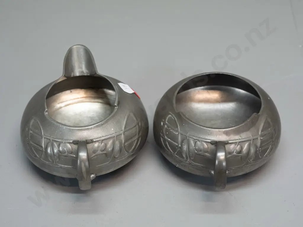 English pewter cream and sugar - Archibald Knox design with nouveau style whiplash decoration - reg. no 0231 marked on Image 1++