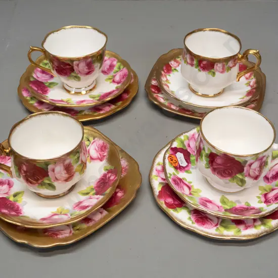 4 Royal Albert rose trios - 3 heavily gilded, one is miniature roses, one is marked Old English Rose. Minor wear to