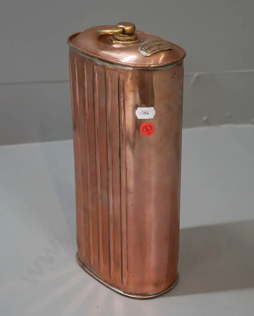 copper and brass hot water bottle / warmer with ribbed sides, threaded cap, "Fill Warmer Quite Full" plaque - has a dent Image 1++