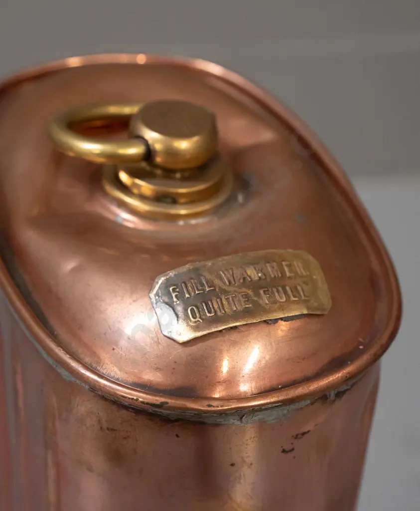copper and brass hot water bottle / warmer with ribbed sides, threaded cap, "Fill Warmer Quite Full" plaque - has a dent Image 1++