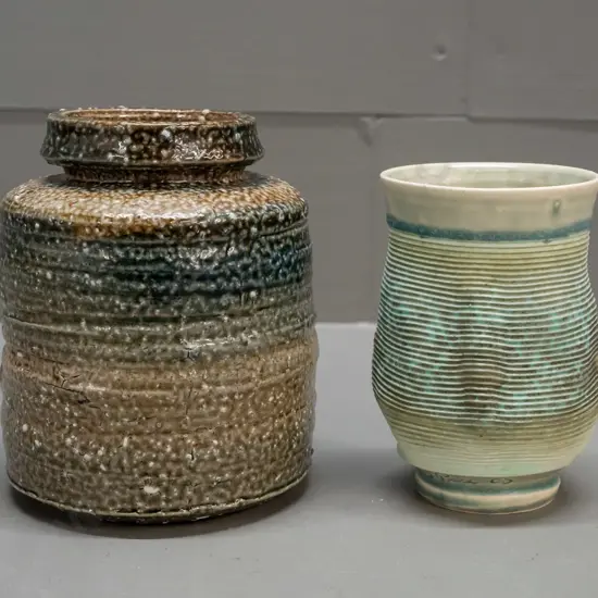 2 pieces of studio pottery - ribbed & textured vase marked J. Pasc or Pax '08 and a salt glazed vase H-140 D-120