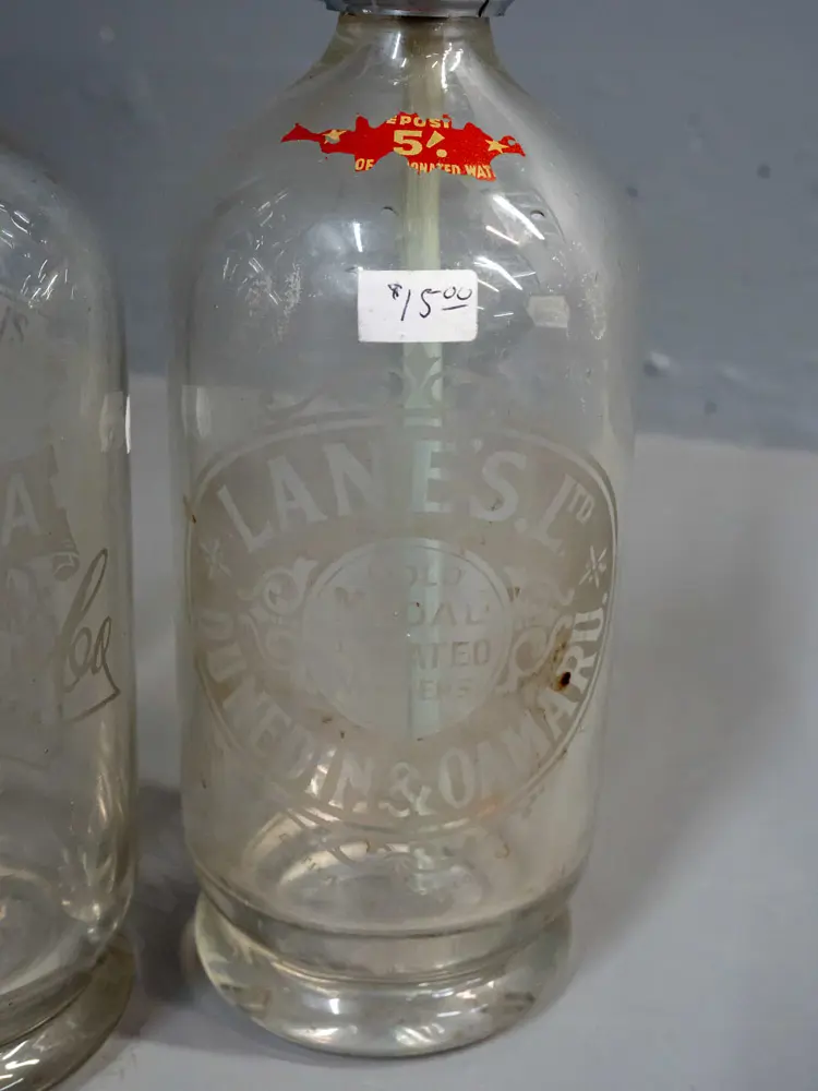 3 vintage Dunedin soda syphon bottles - Thomsons with fluted body, Thomsons Wairongoa and Lane's - all with correct taps Image 1++