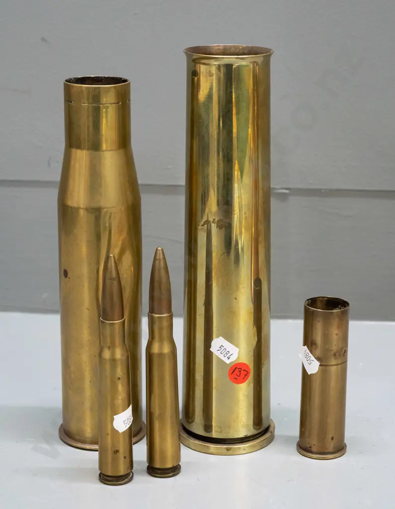 5 assorted brass cartridge shells, one with dents, tallest has flared top for use as vase H-240 Image 1++