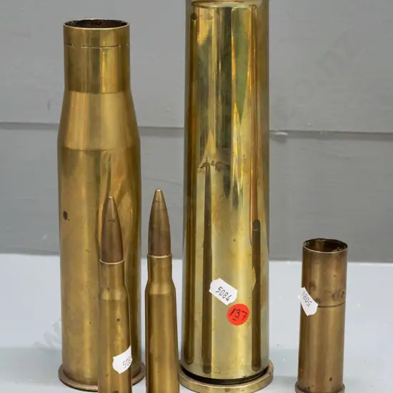 5 assorted brass cartridge shells, one with dents, tallest has flared top for use as vase H-240