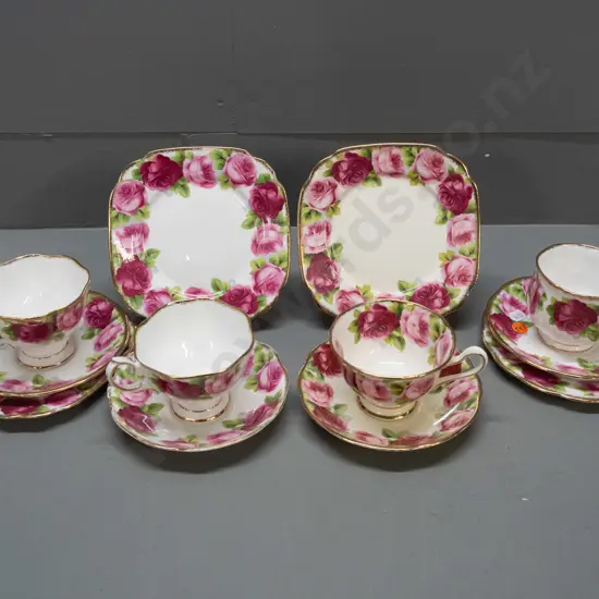 4 Royal Albert Old English Rose trios - differing shapes and styles, one ivory tone