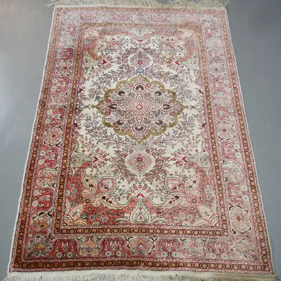 silk floor rug in multi-coloured floral and foliate motifs - wear and staining, some fading L-1620 W-1040