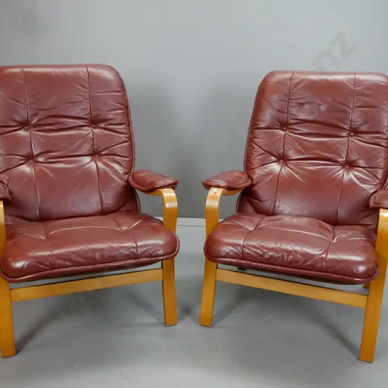 pair of retro Danish style bent beech framed armchairs with buttoned leather backs and arm pads - minor wear to arms