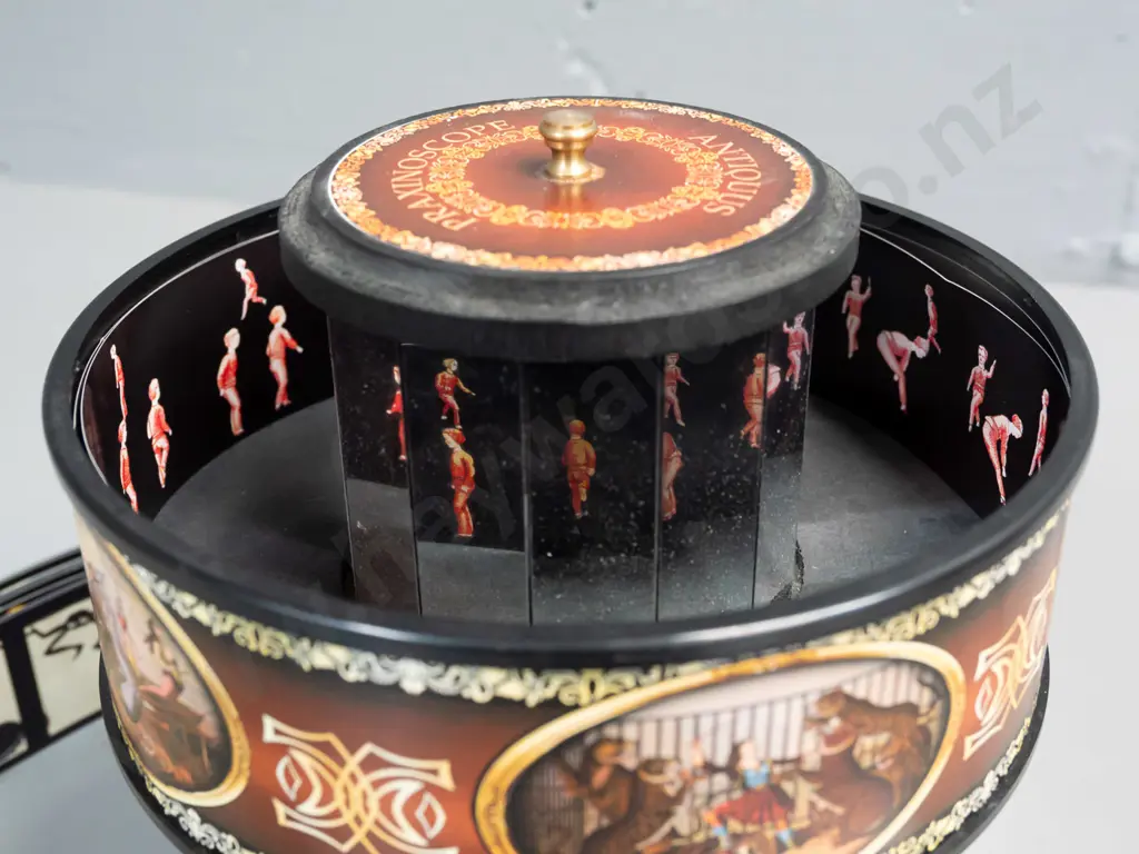 Hemisferium reproduction praxinoscope moving picture device with spinning gallery, viewing mirrors and assorted paper Image 1++