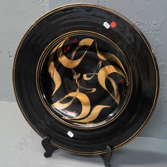 studio pottery wall charger - dark blue with swirling gilt and red enamel decoration - hard to read signature, dated '98