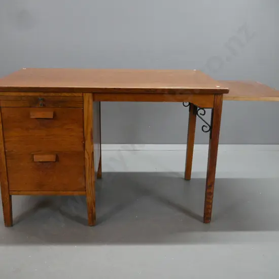 vintage oak single pedestal desk with slide on left side above shallow drawer, 2 large drawers, end slide, added wrought